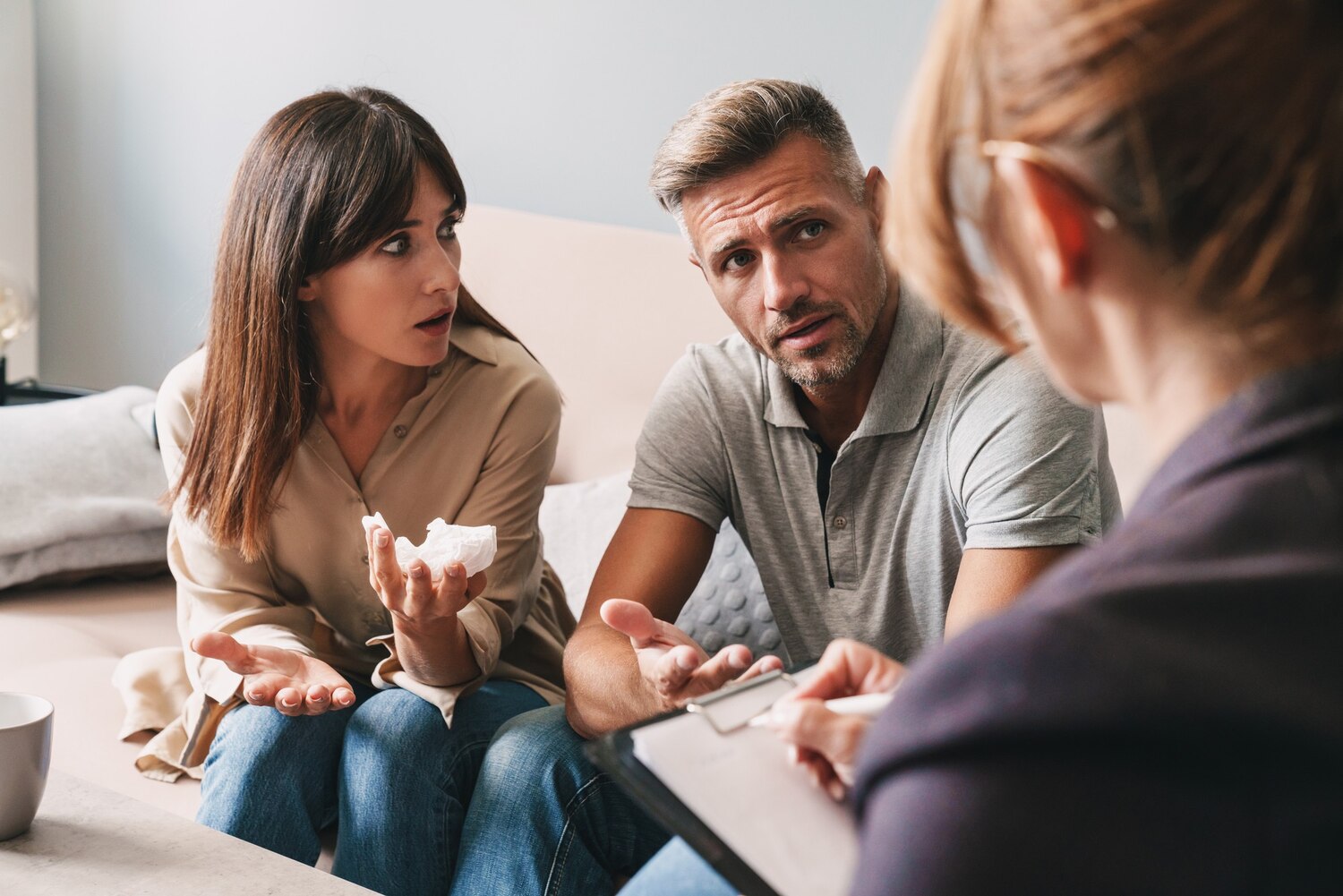 photo puzzled unhappy couple man woman having conversation with psychologist therapy session room 171337 112517 photo puzzled unhappy couple man woman having conversation with psychologist therapy session room 171337 112517