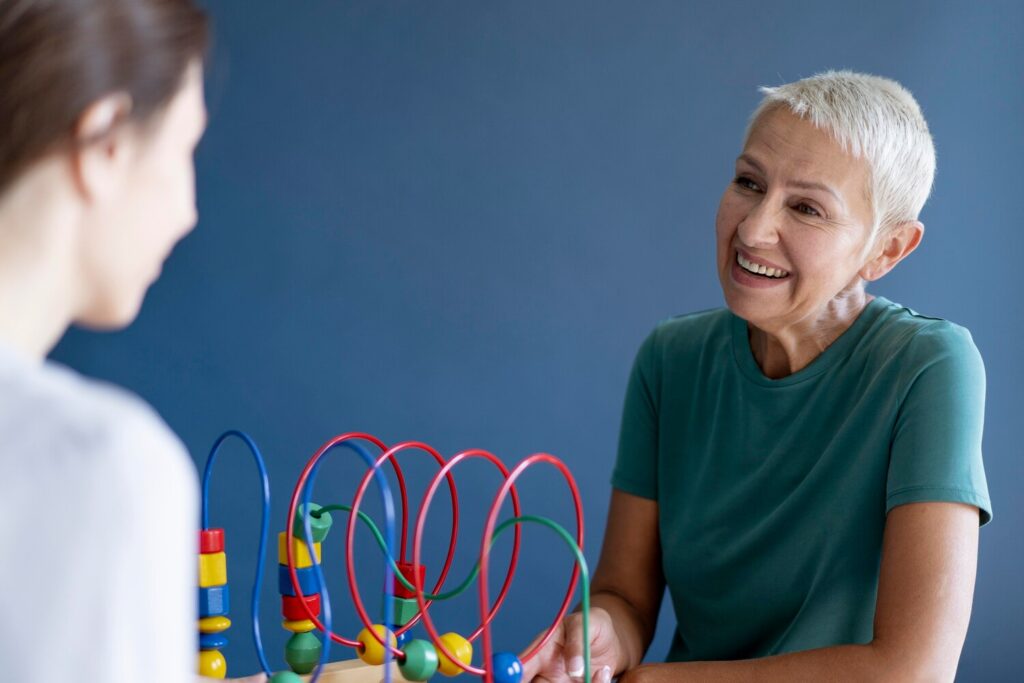 mature woman doing occupational therapy session with psychologist 23 2149091461 mature woman doing occupational therapy session with psychologist 23 2149091461